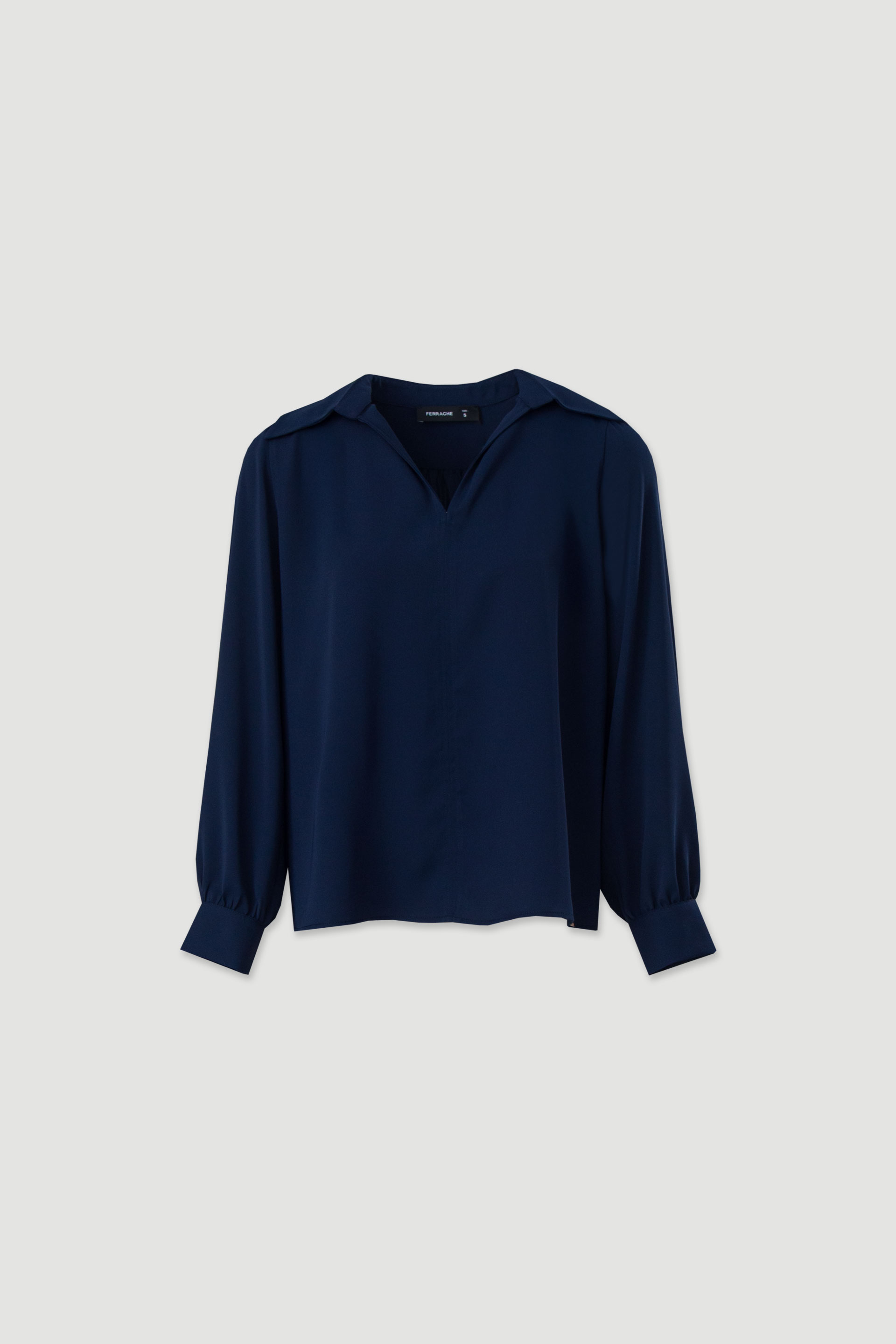 Túnica fluida con mangas abullonadas