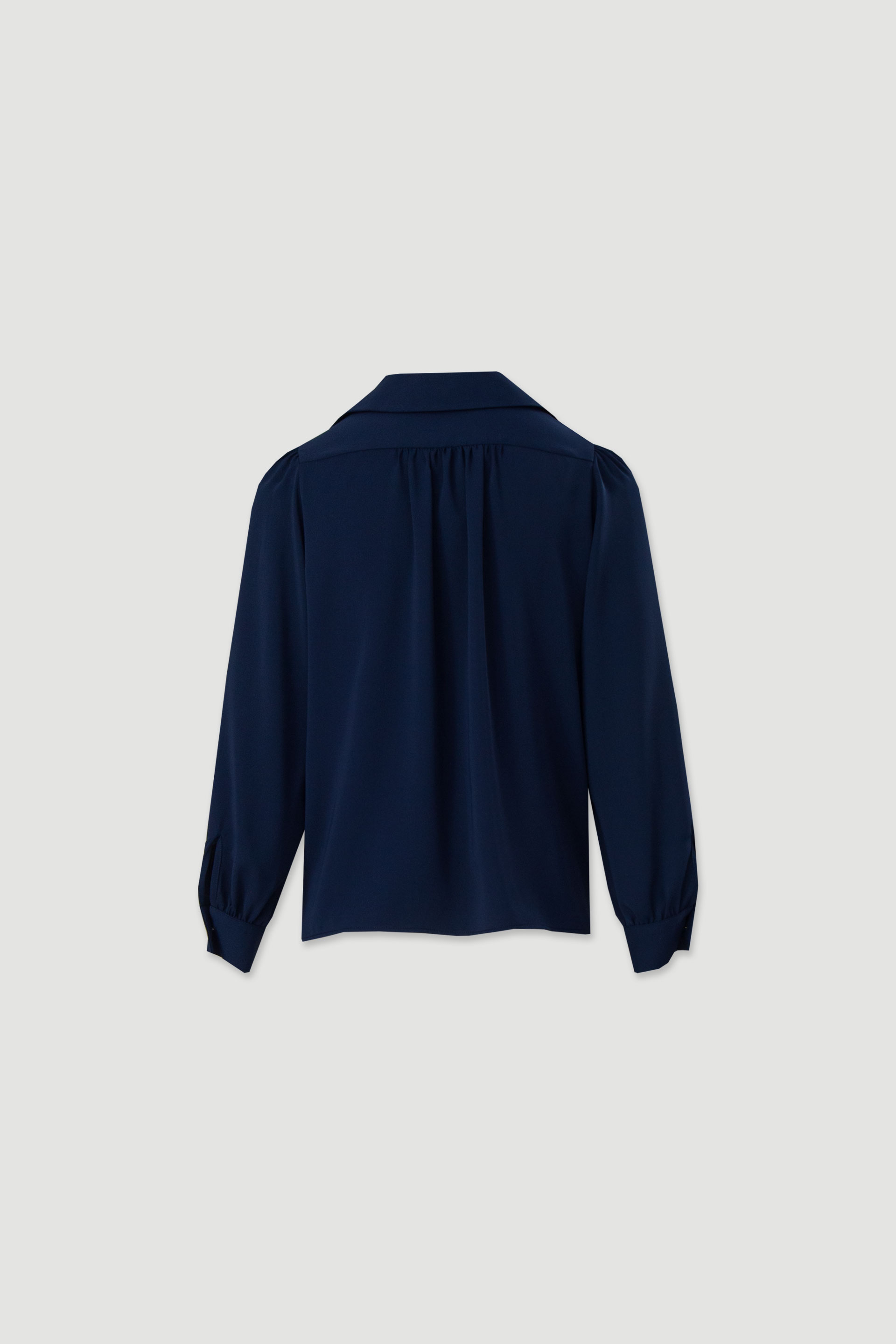 Túnica fluida con mangas abullonadas