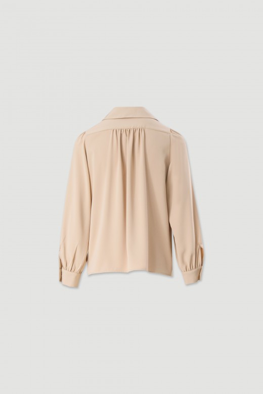 Fluid tunic with puff sleeves