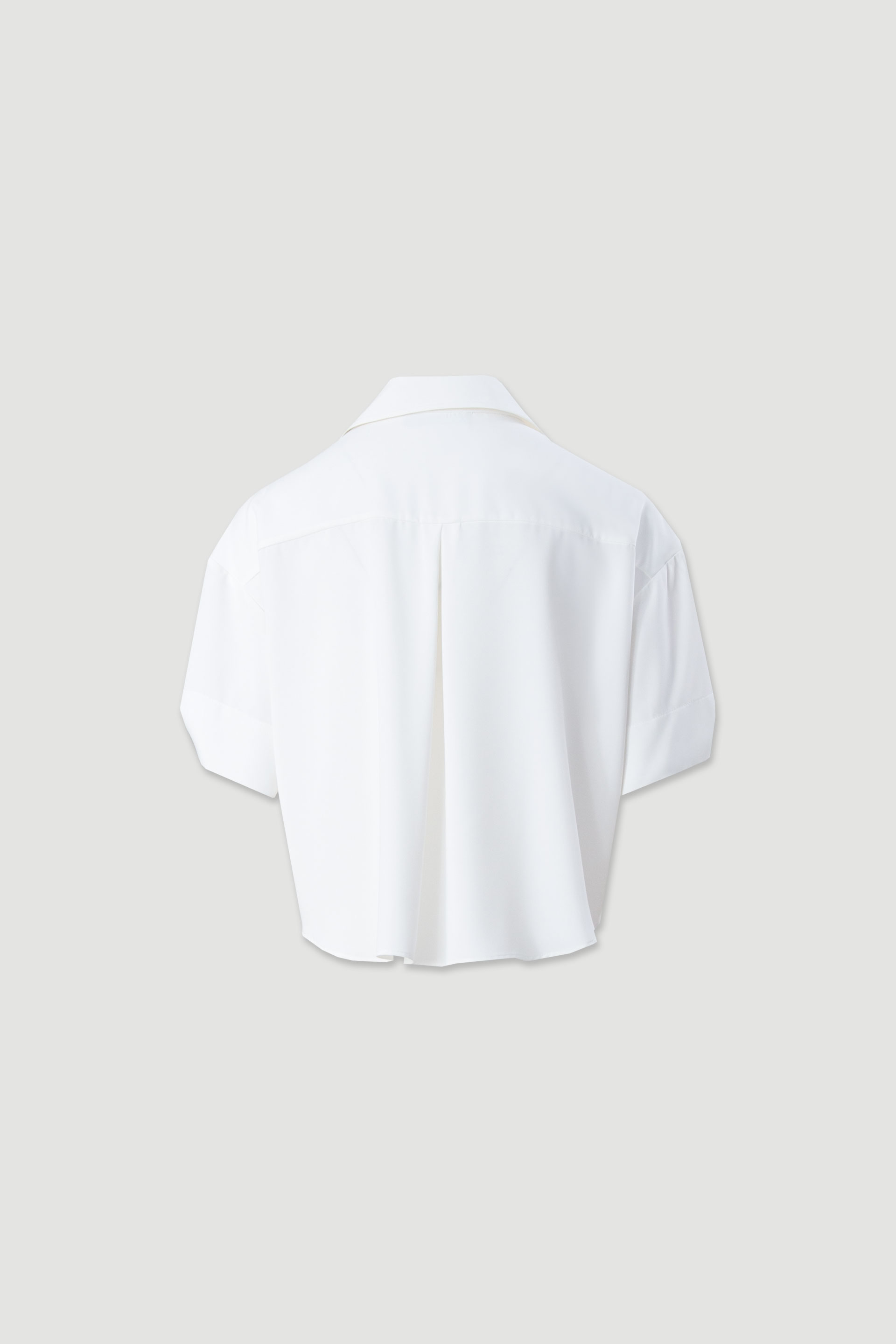 Blouse courte fluide en 100 % coton avec décolleté en v