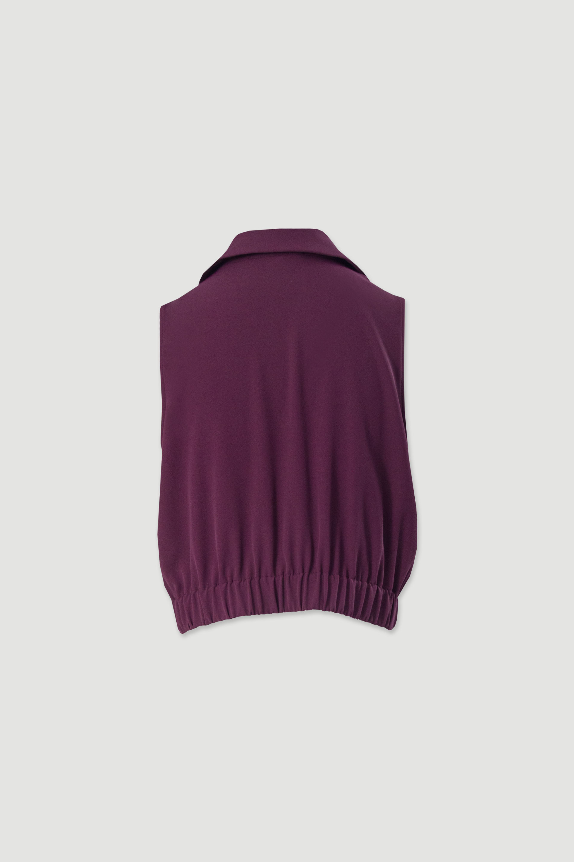 Top corto cruzado con cinturilla elástica