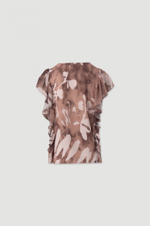 Blusa estampada con volantes laterales