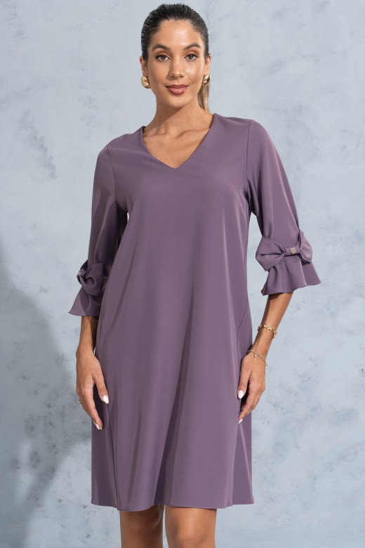 Vestido fluido con escote en v y manga con lazo