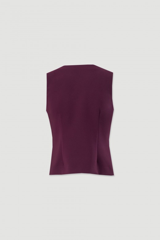 Fitted short vest with wrap-style closure