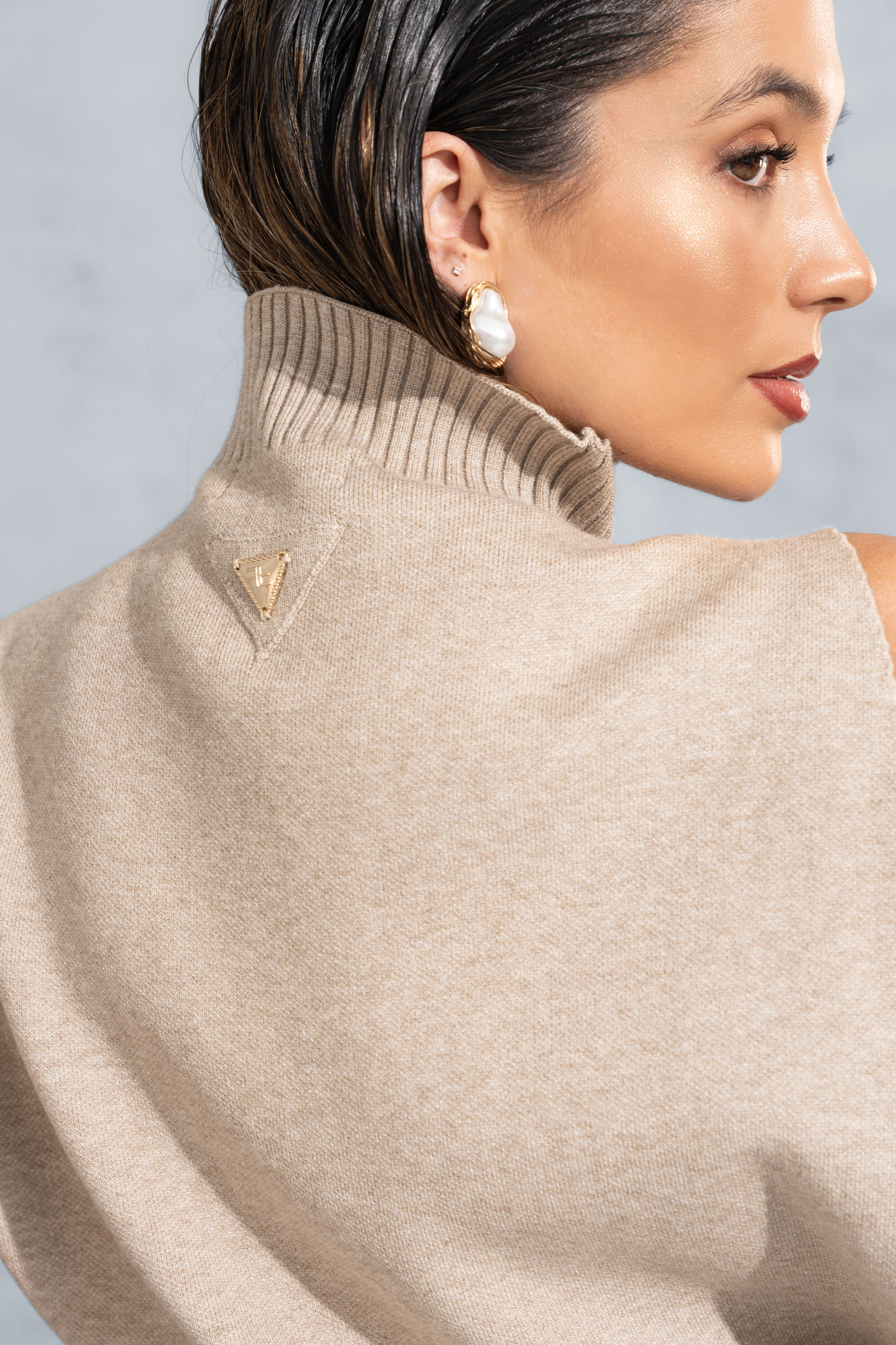 Colete de malha de gola alta