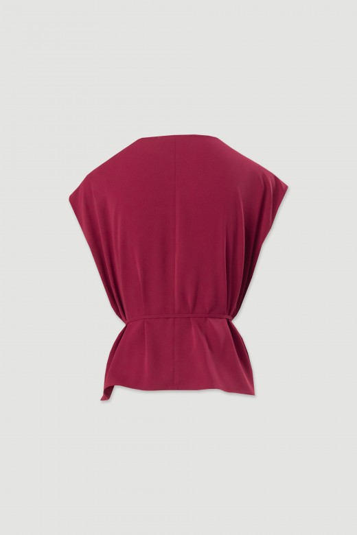 Fluid top with draped neckline and belt