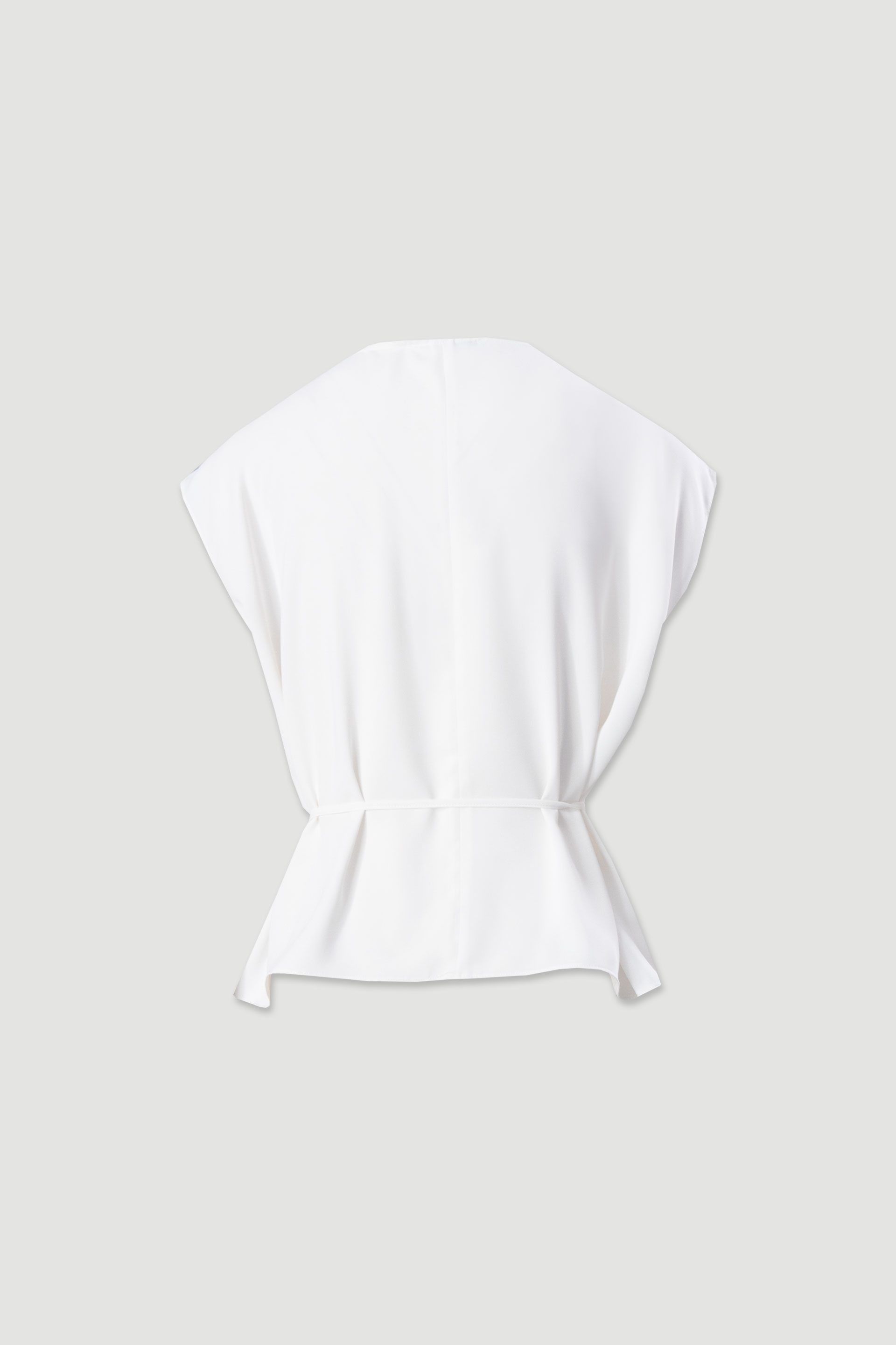 Fluid top with draped neckline and belt