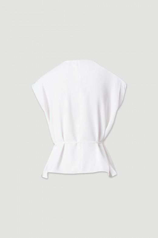 Fluid top with draped neckline and belt