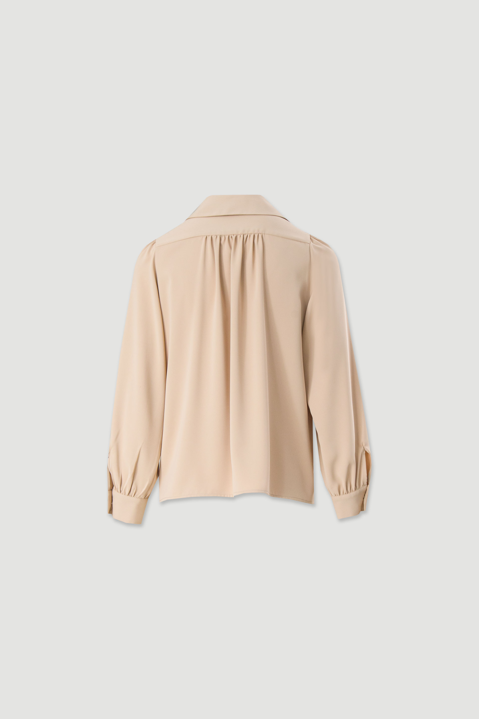 Túnica fluida con mangas abullonadas