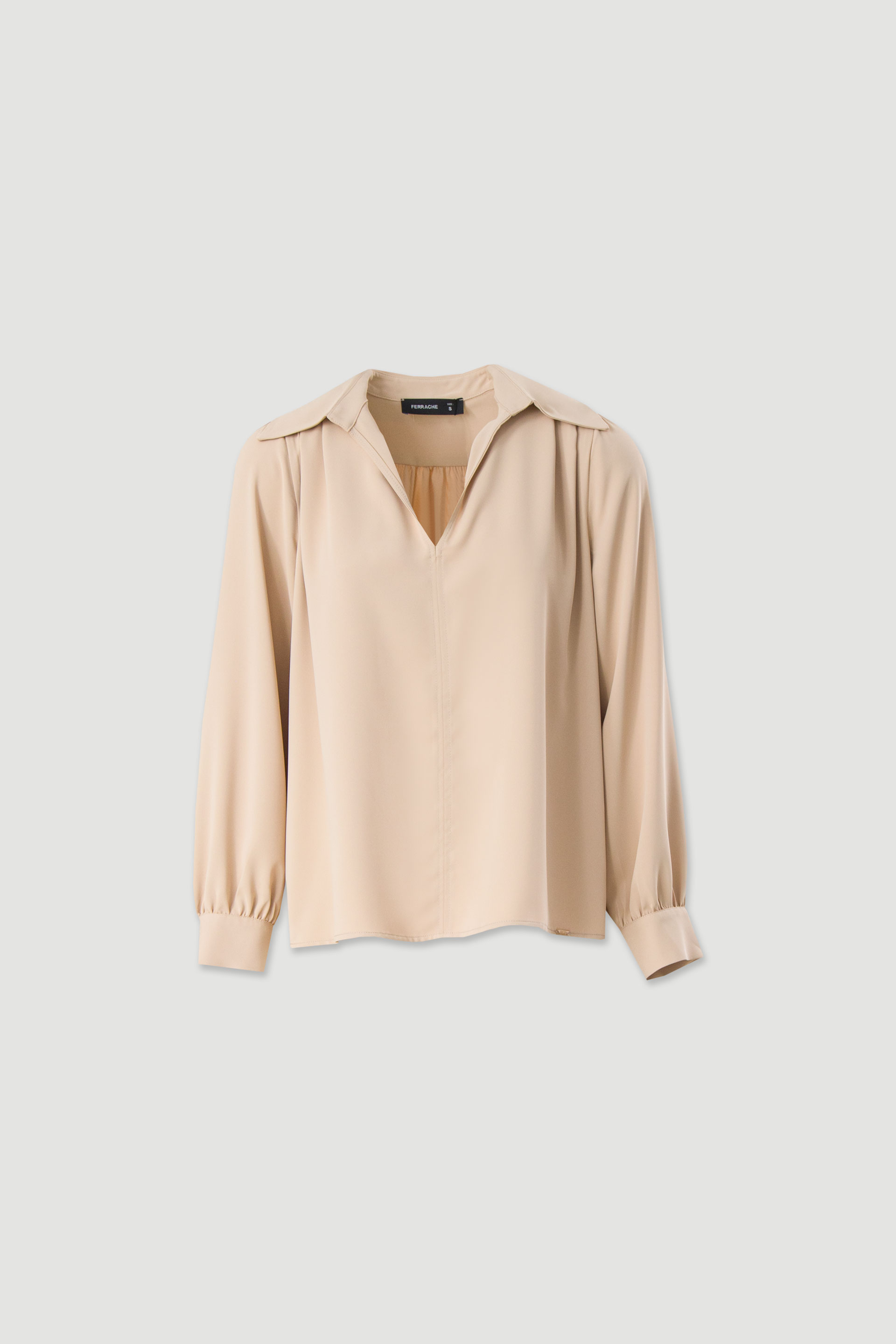 Túnica fluida con mangas abullonadas