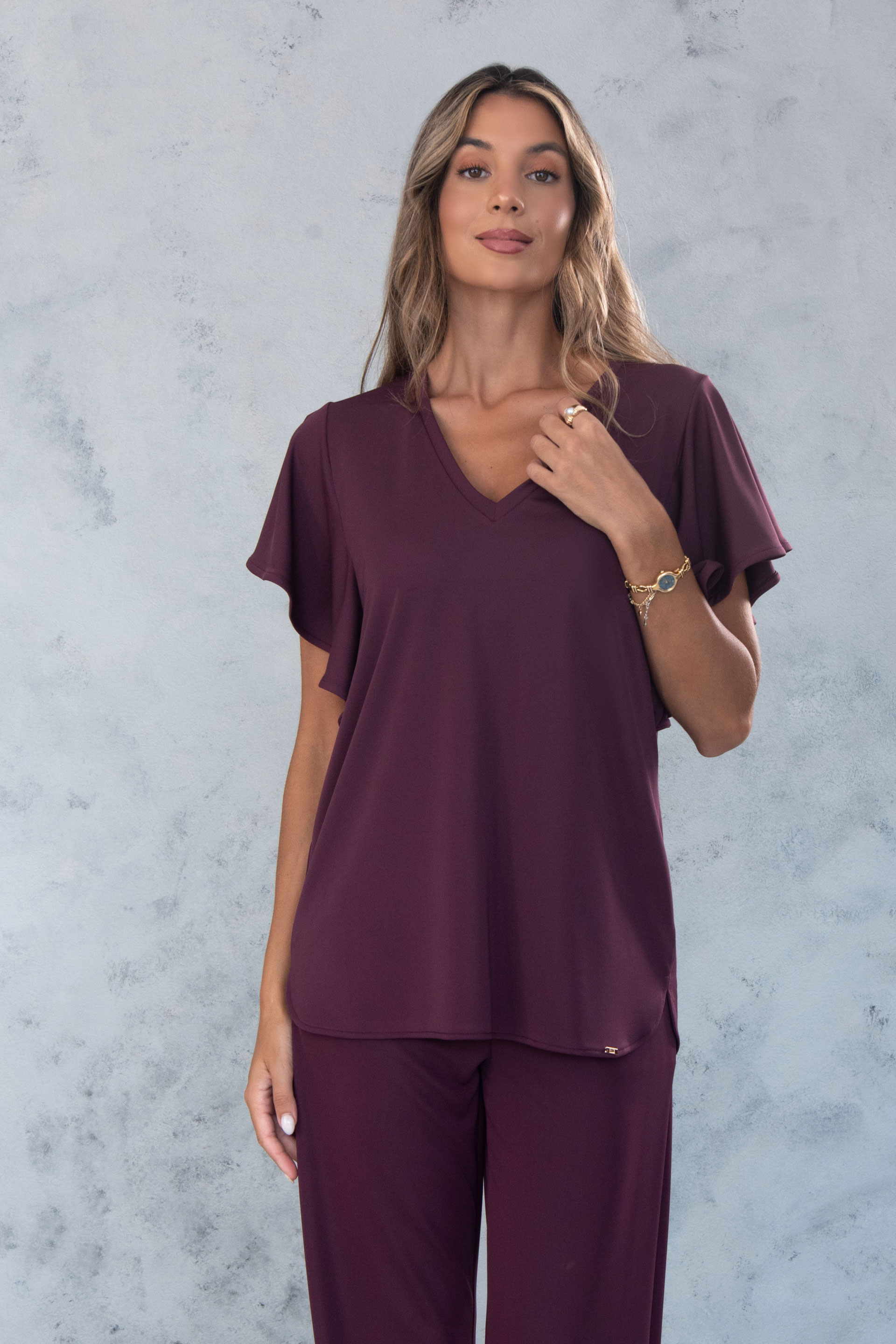 Túnica con escote en v y mangas con volante