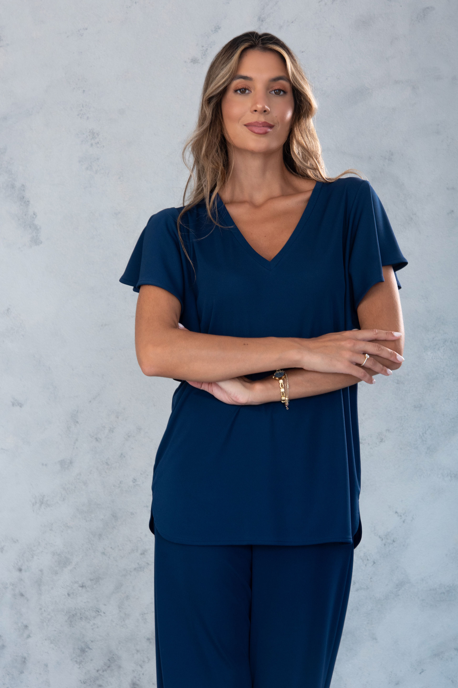 Túnica con escote en v y mangas con volante