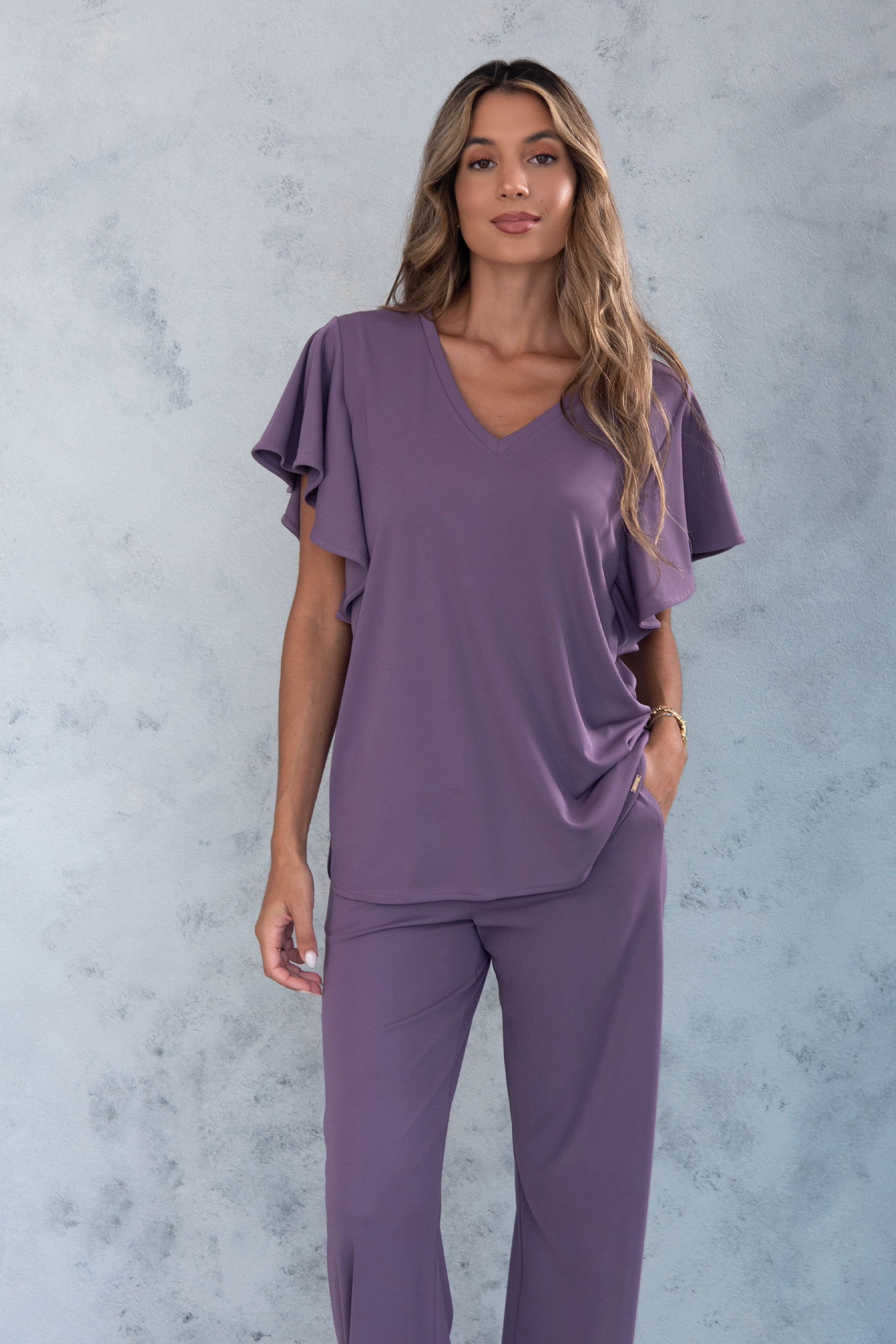 Túnica con escote en v y mangas con volante