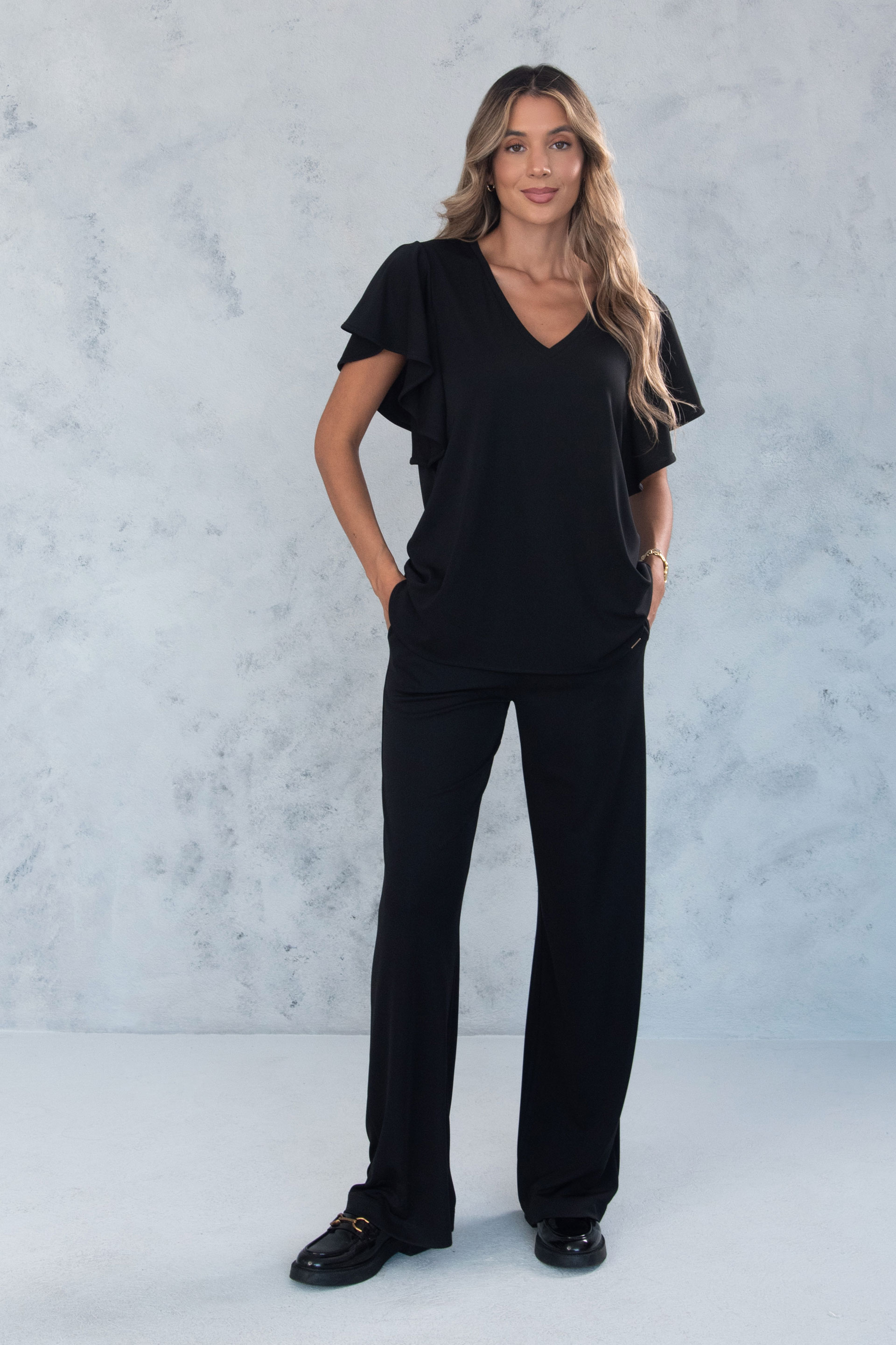 Túnica con escote en v y mangas con volante