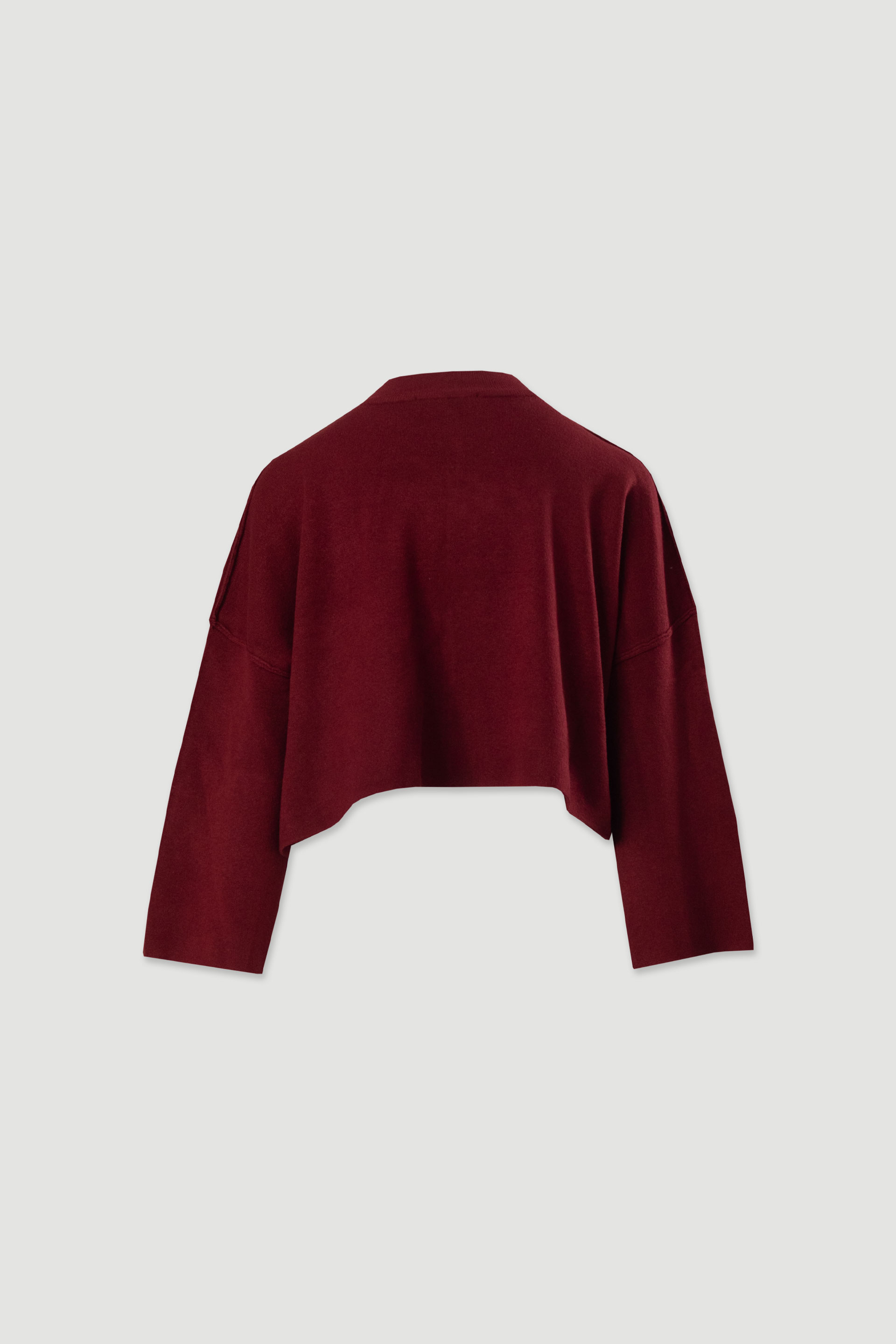 Short knit sweater with ribbed detail