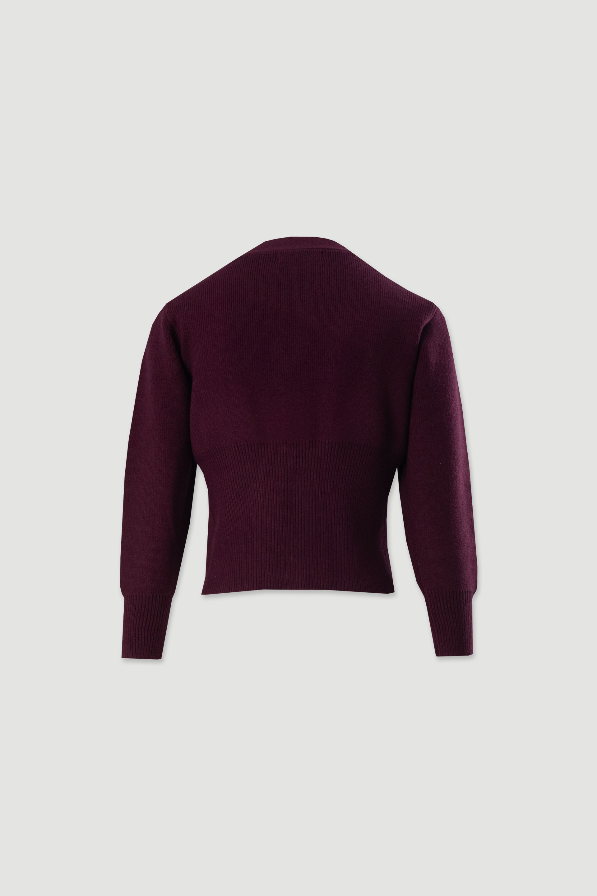 Casaco de malha com botão dourado