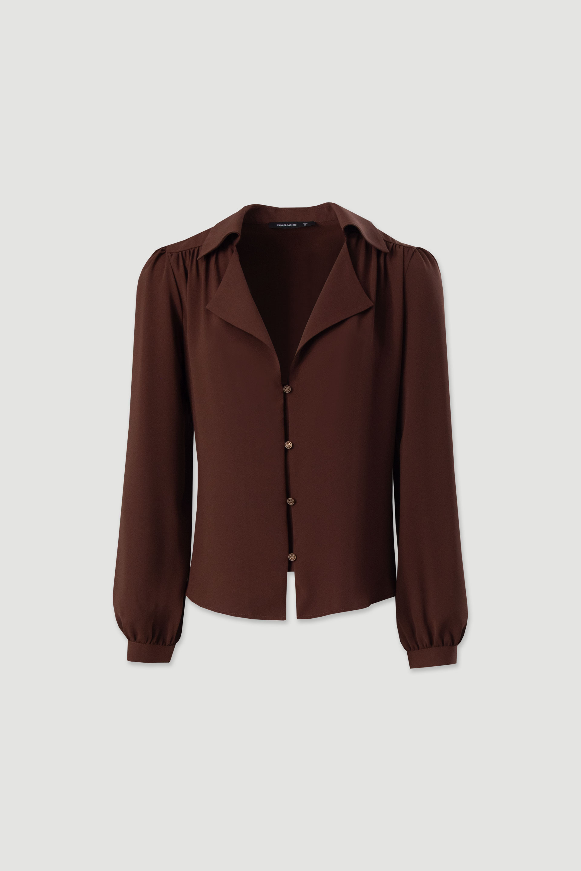 Blusa clásica con cuello y botones frontales