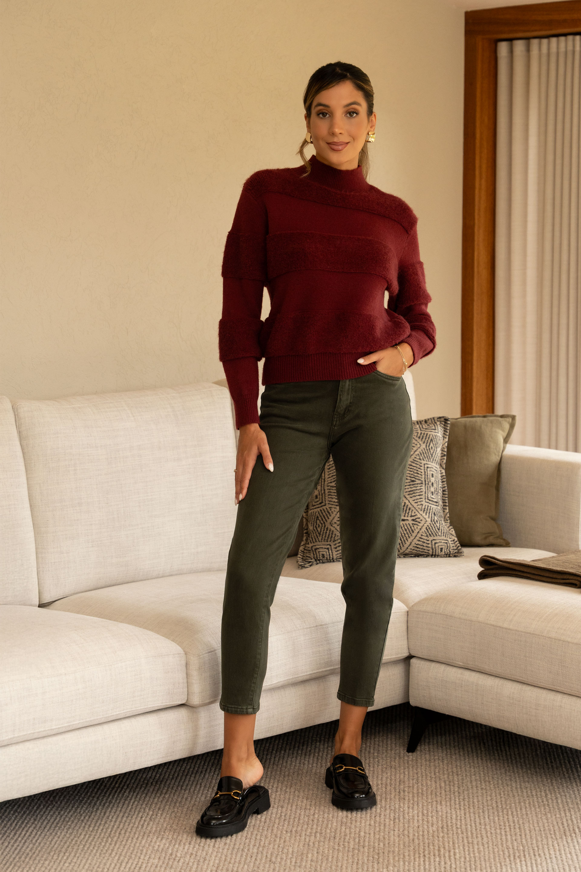 Knit sweater with faux shearling detail