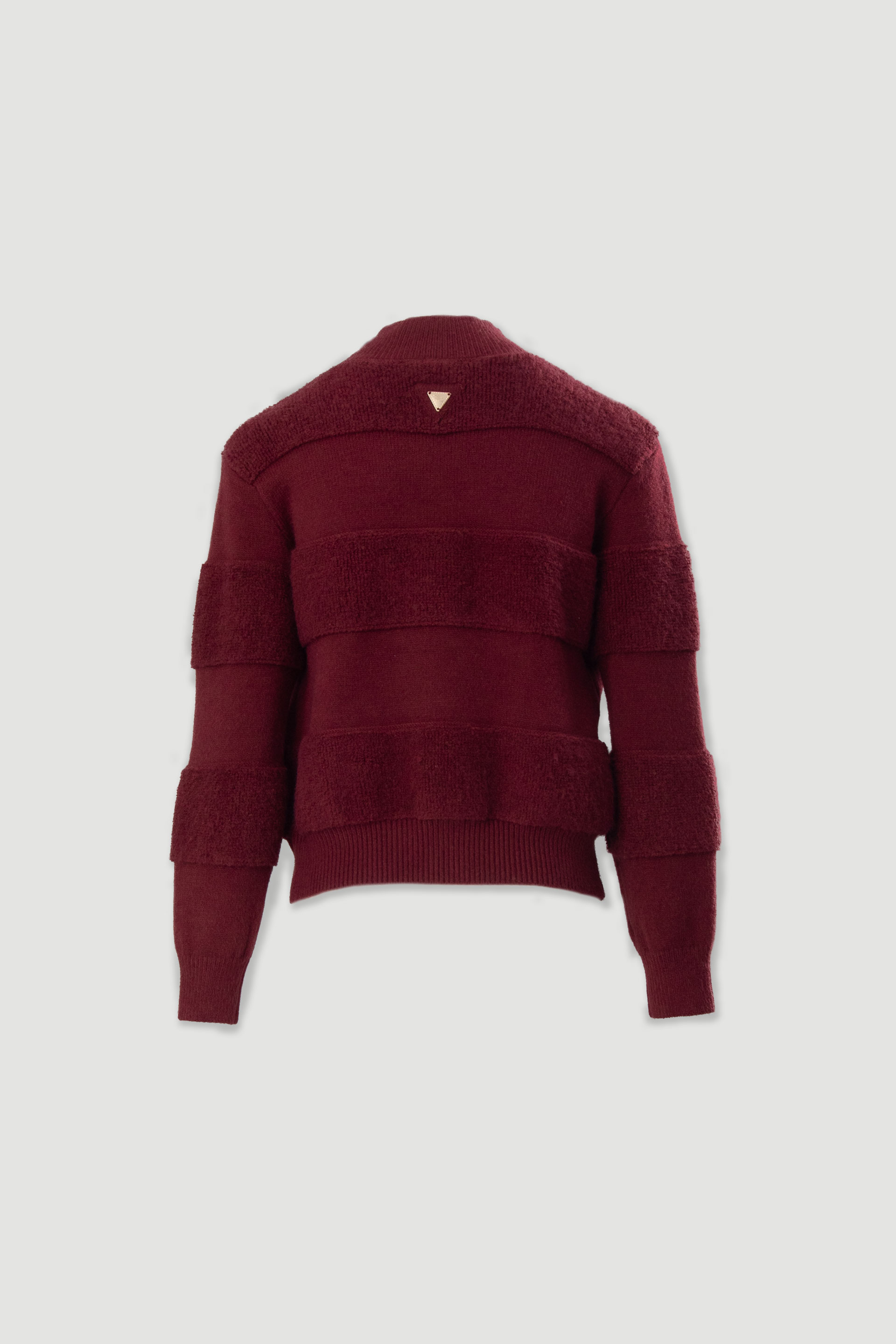 Knit sweater with faux shearling detail