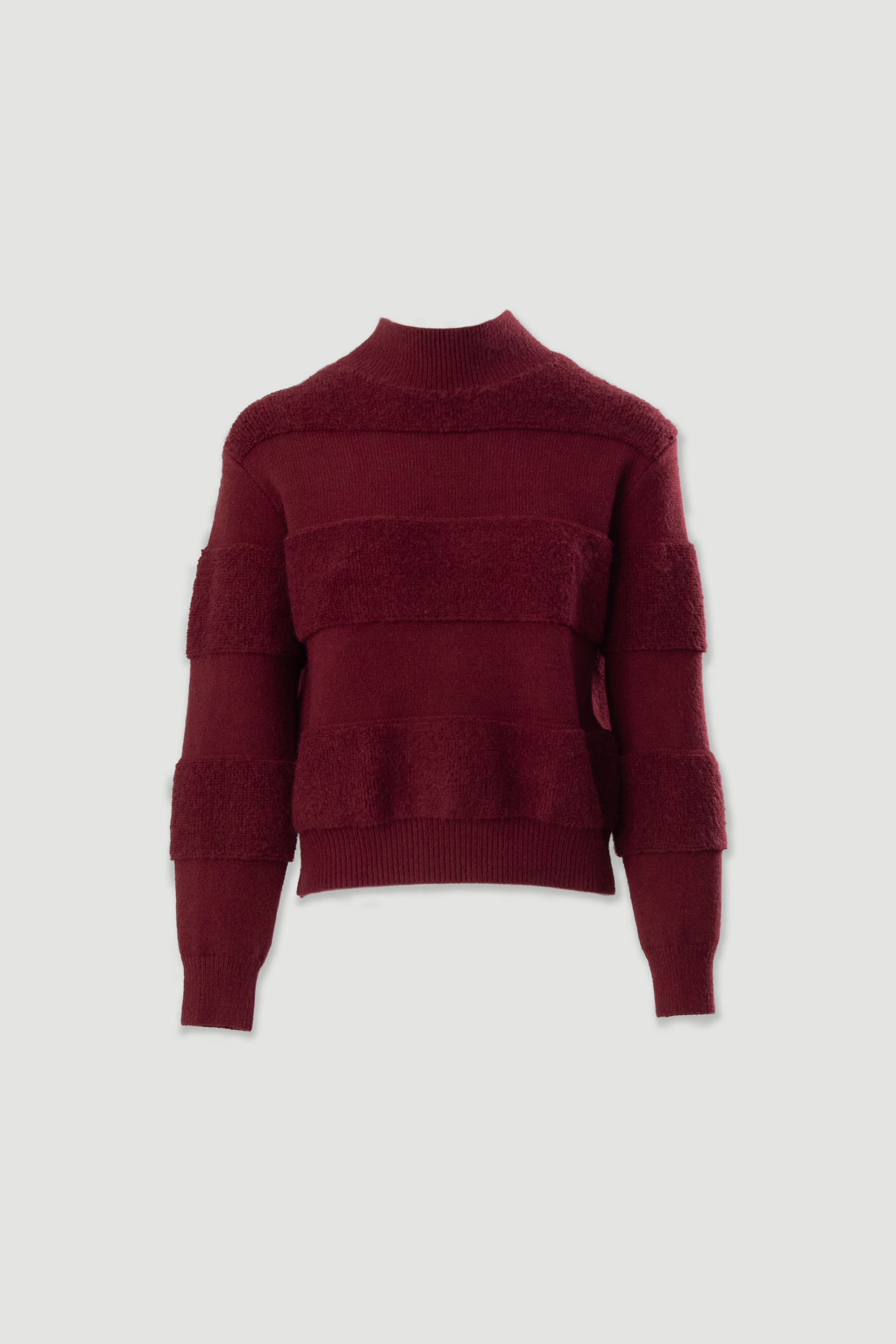 Knit sweater with faux shearling detail