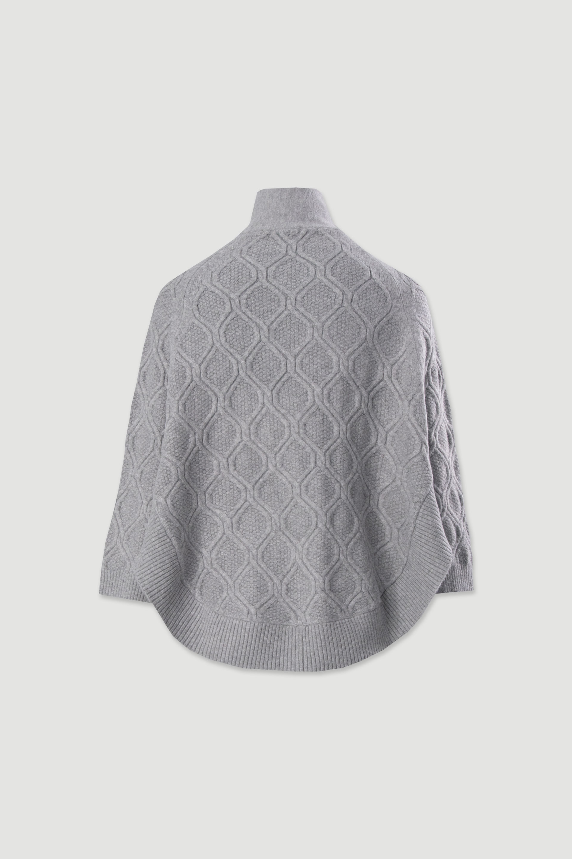 Capa de malha com efeito trabalhado e gola cruzada
