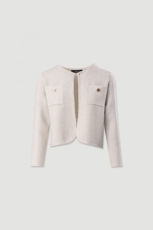 Veste courte en maille structure avec poches frontales