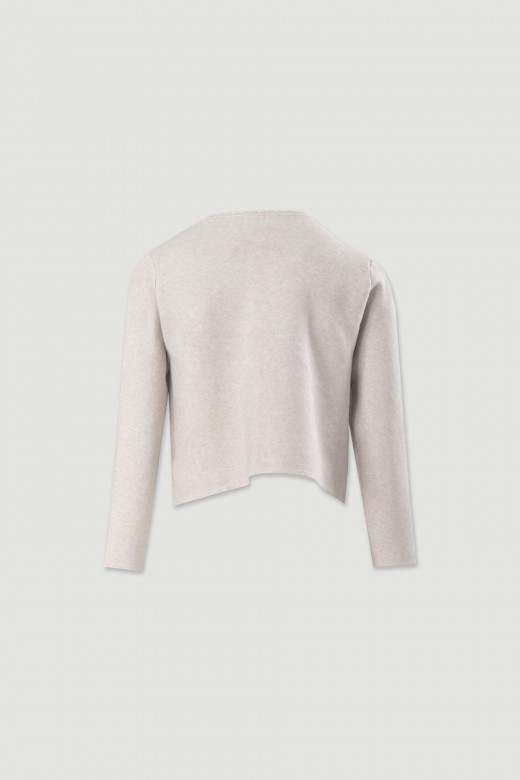 Veste courte en maille structure avec poches frontales
