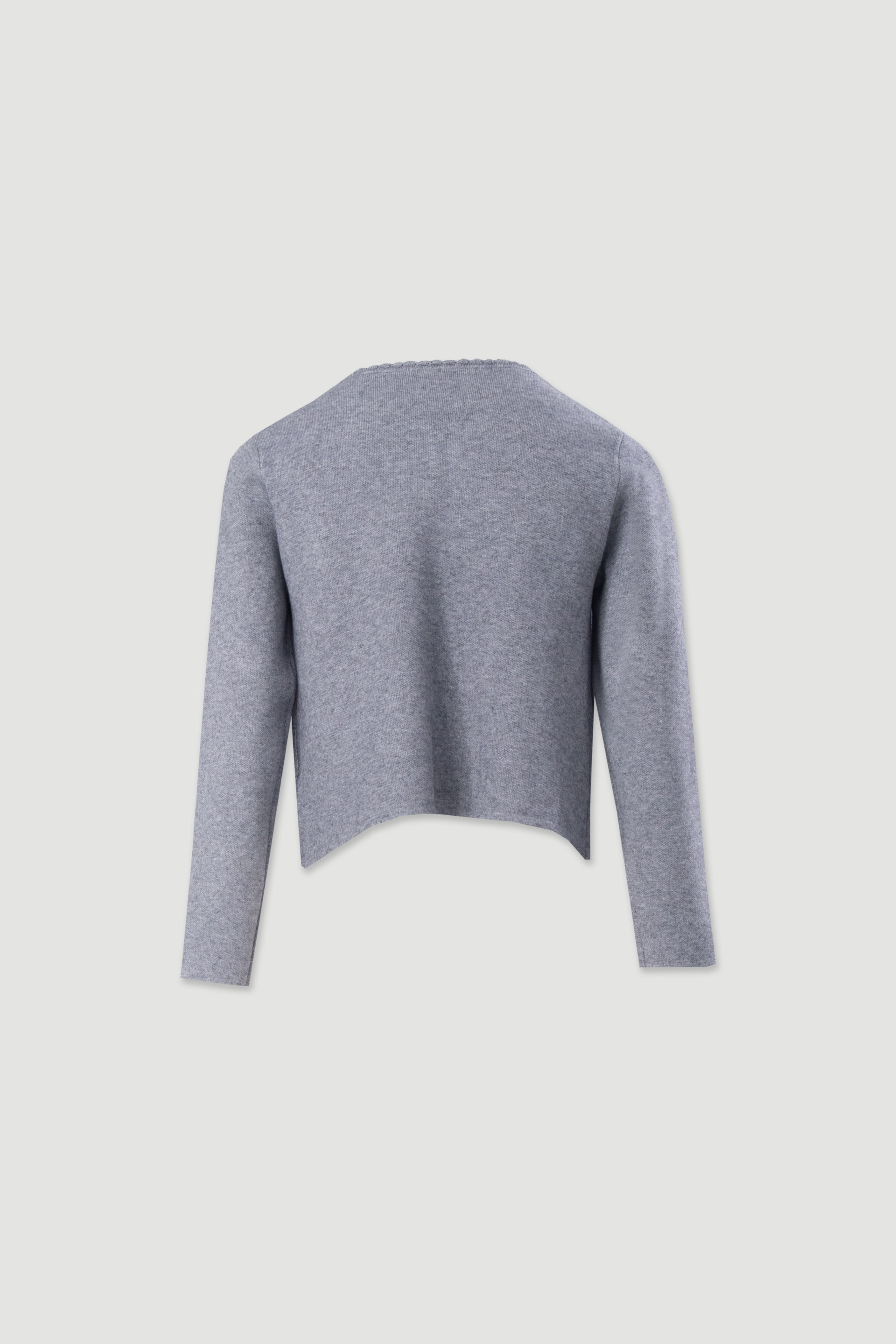 Chaqueta corta de punto estructurado con bolsillos frontales