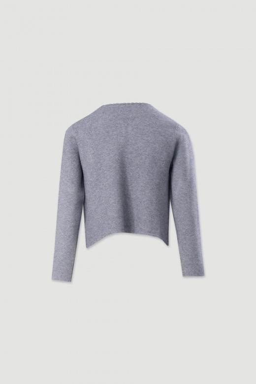 Veste courte en maille structure avec poches frontales
