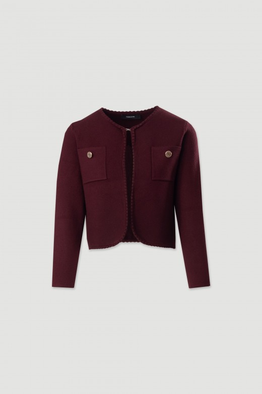 Veste courte en maille structure avec poches frontales