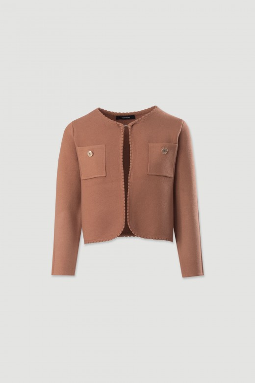 Veste courte en maille structure avec poches frontales
