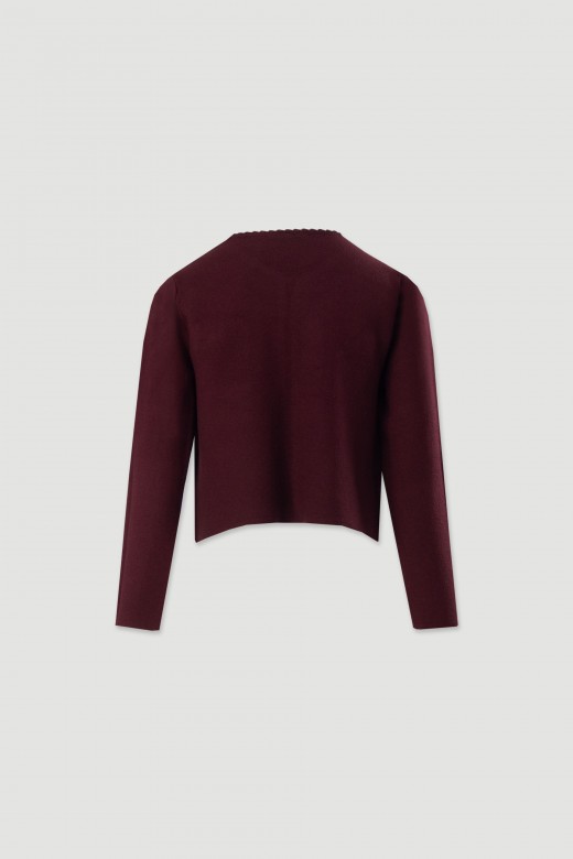 Veste courte en maille structure avec poches frontales