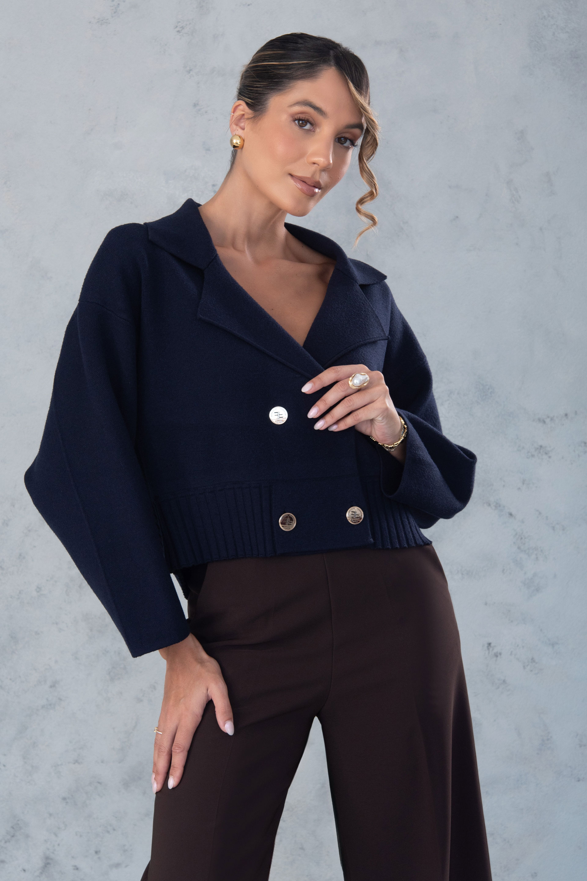 Knit cardigan with custom metallic logo buttons