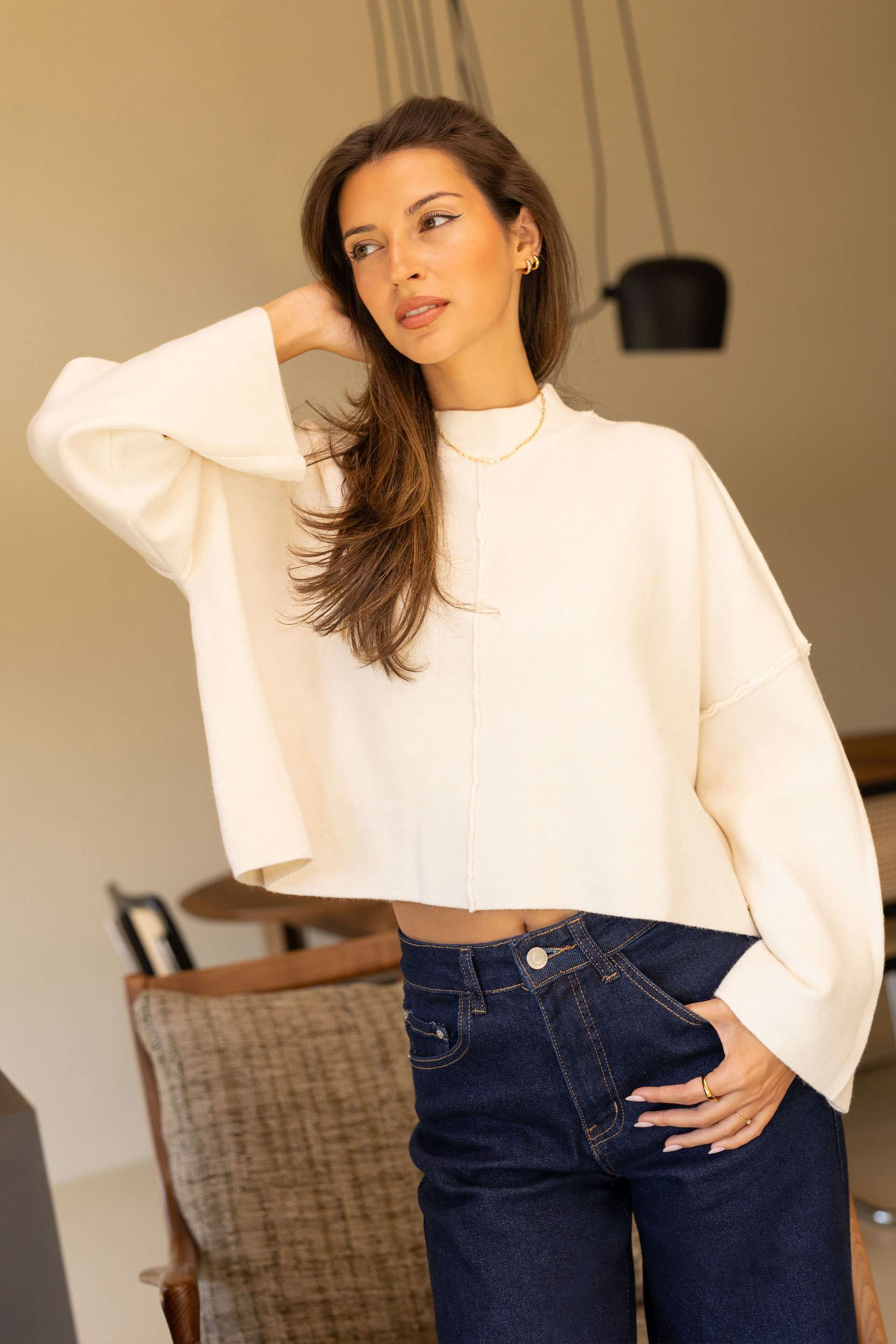 Short knit sweater with ribbed detail