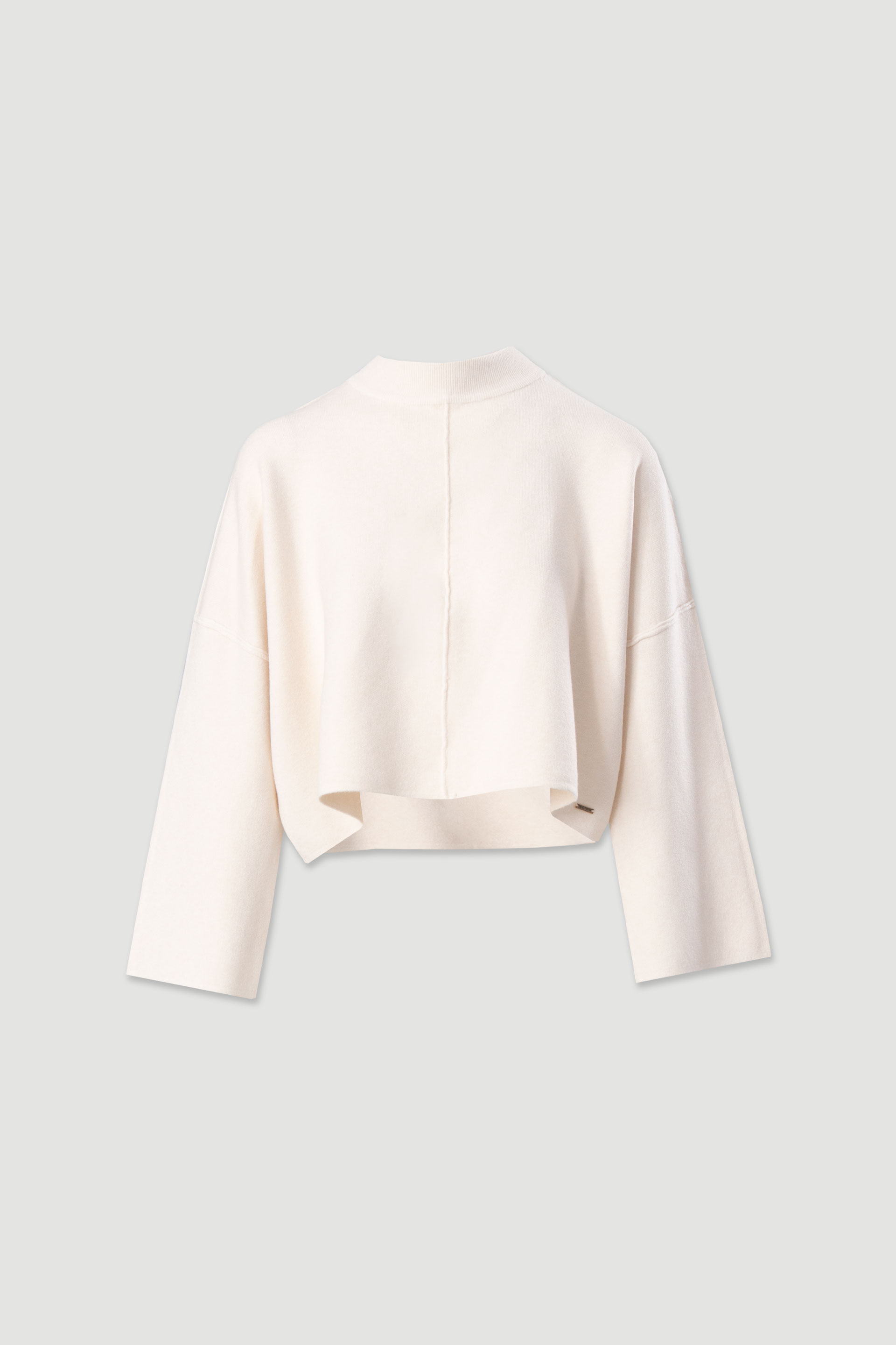 Short knit sweater with ribbed detail