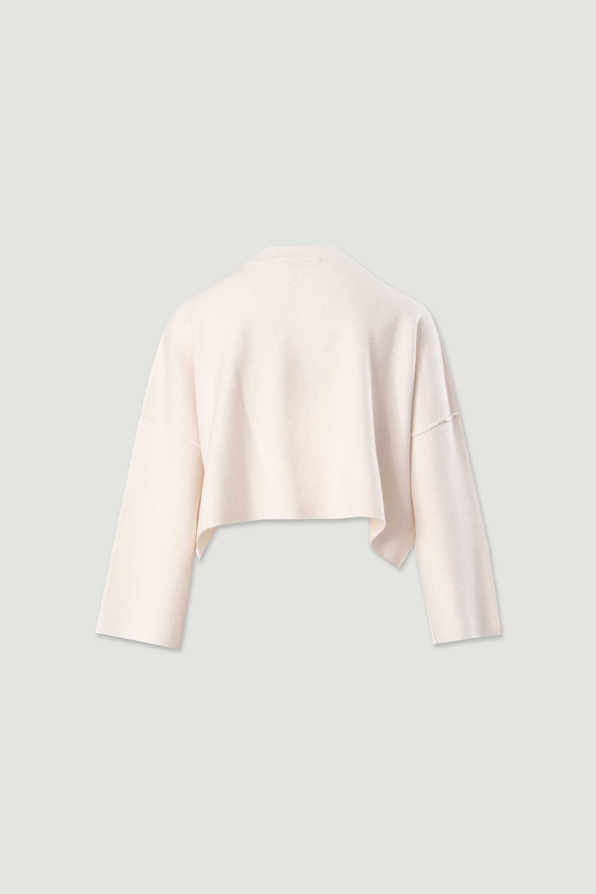 Short knit sweater with ribbed detail