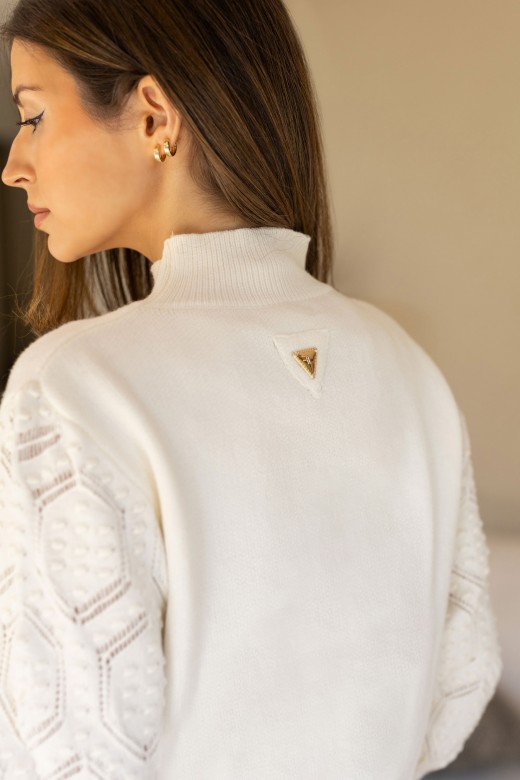 Knitted sweater with textured sleeves