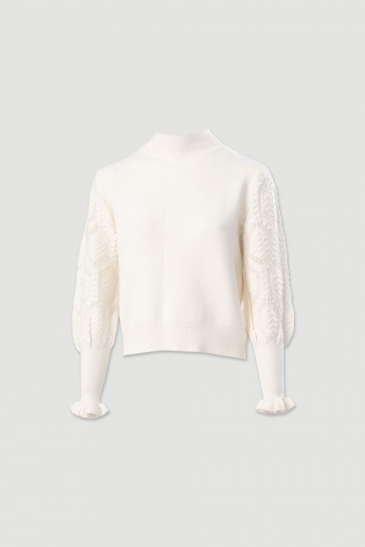 Knitted sweater with textured sleeves