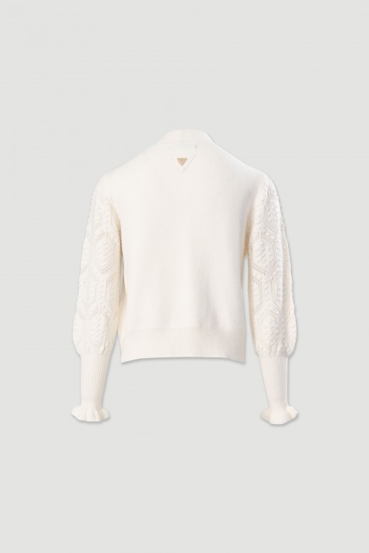 Knitted sweater with textured sleeves