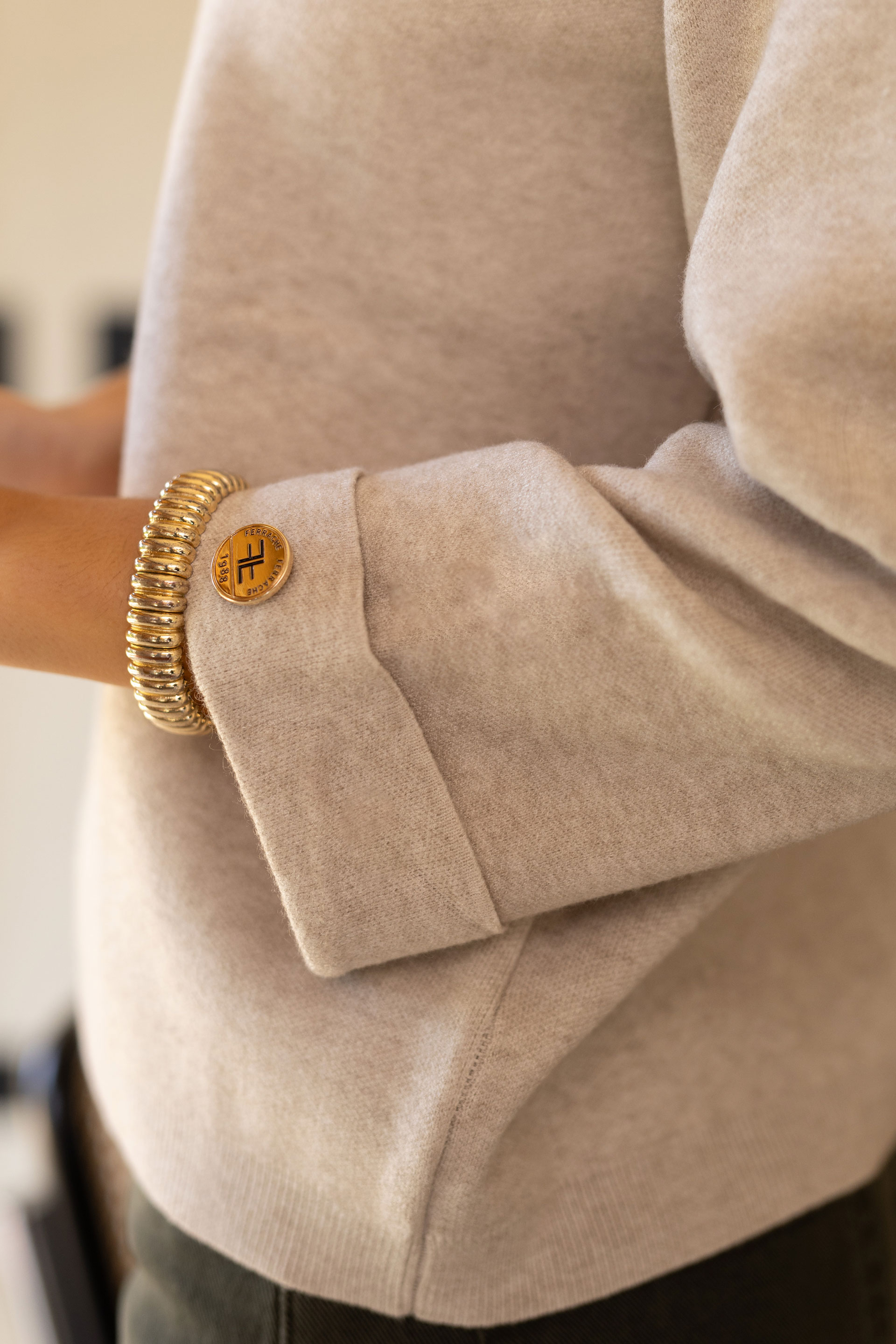 Knit sweater with 3/4 sleeves and button detail