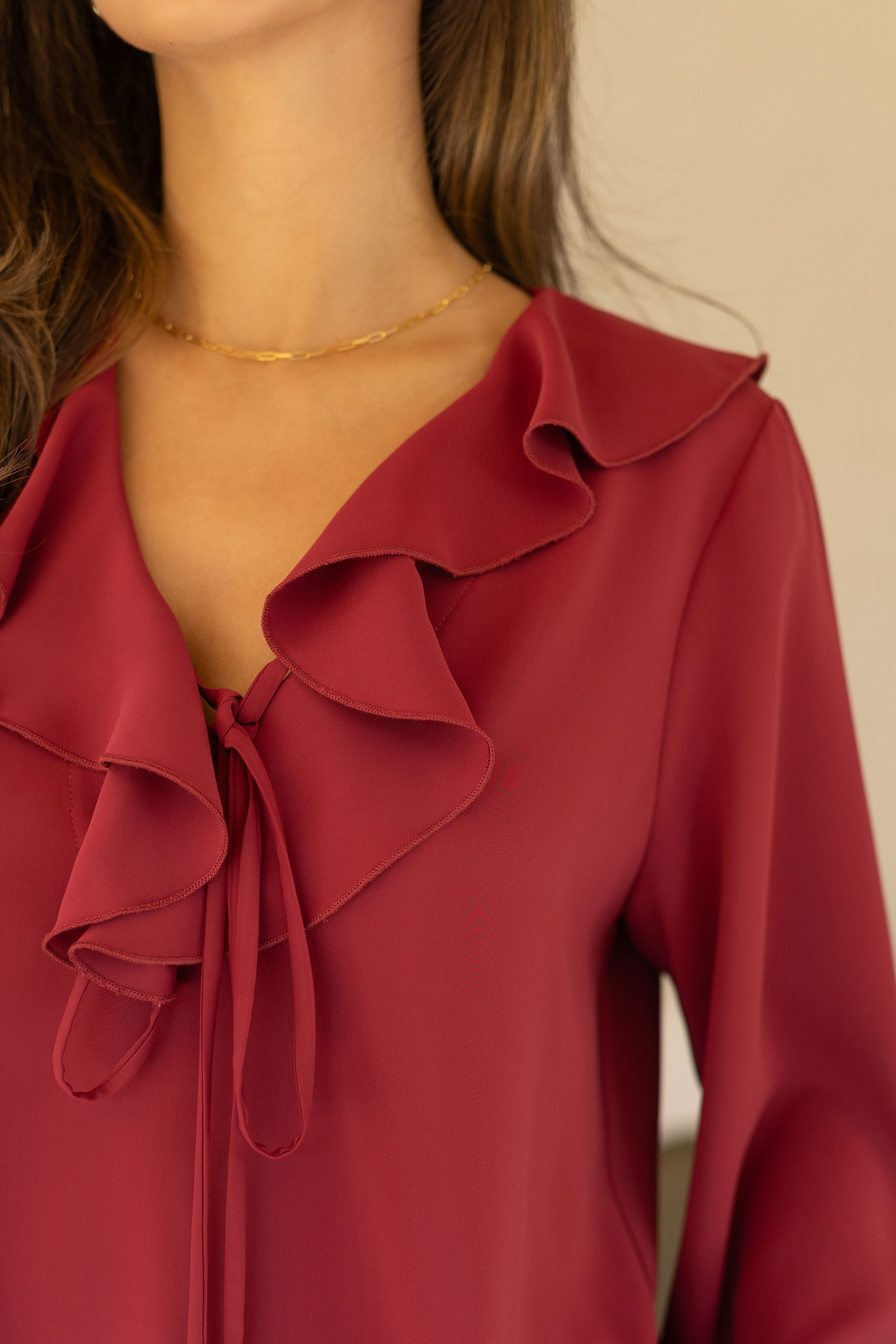 Blouse with ruffle and tie neckline