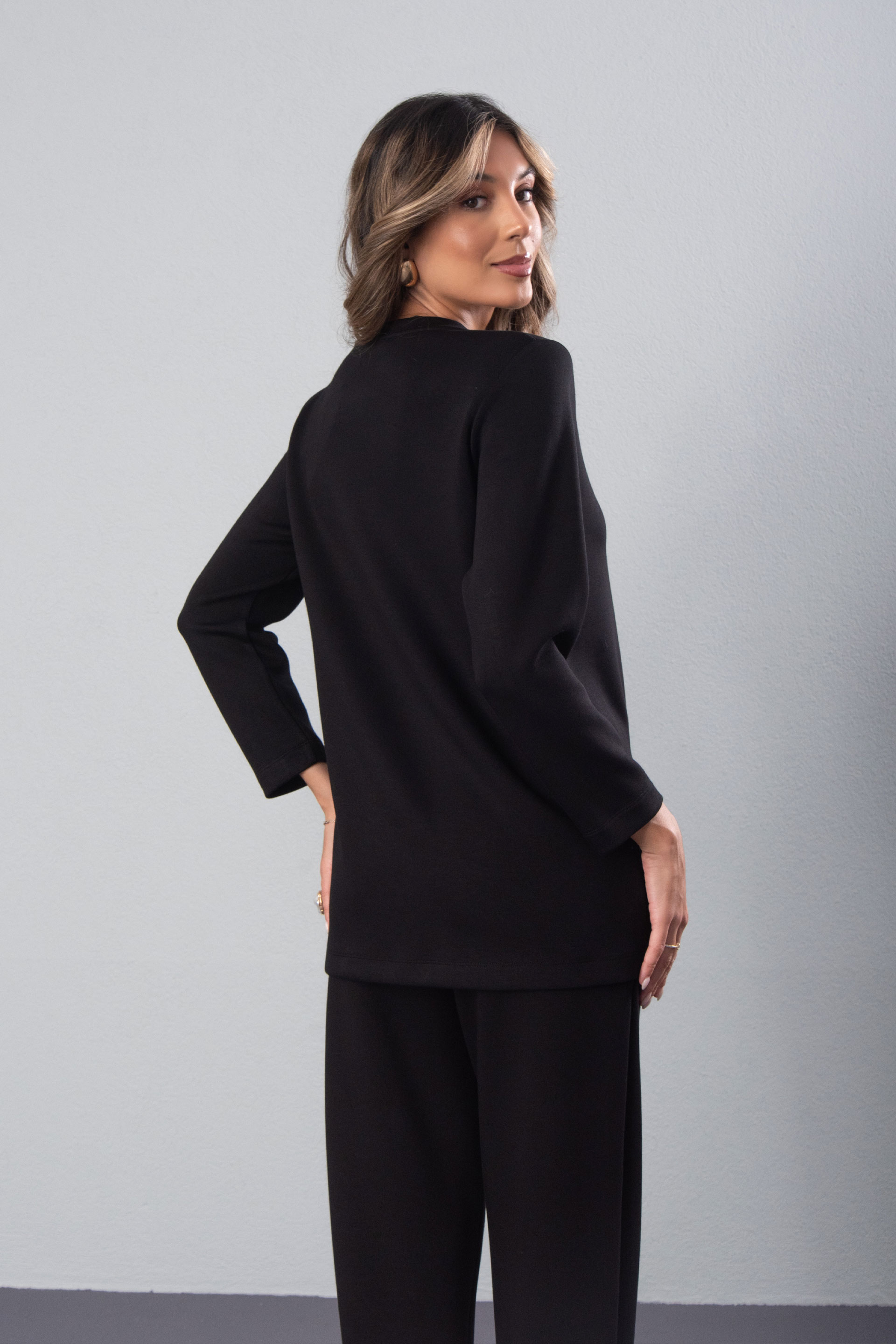 Tunique avec fermetures éclair métalliques sur les côtés