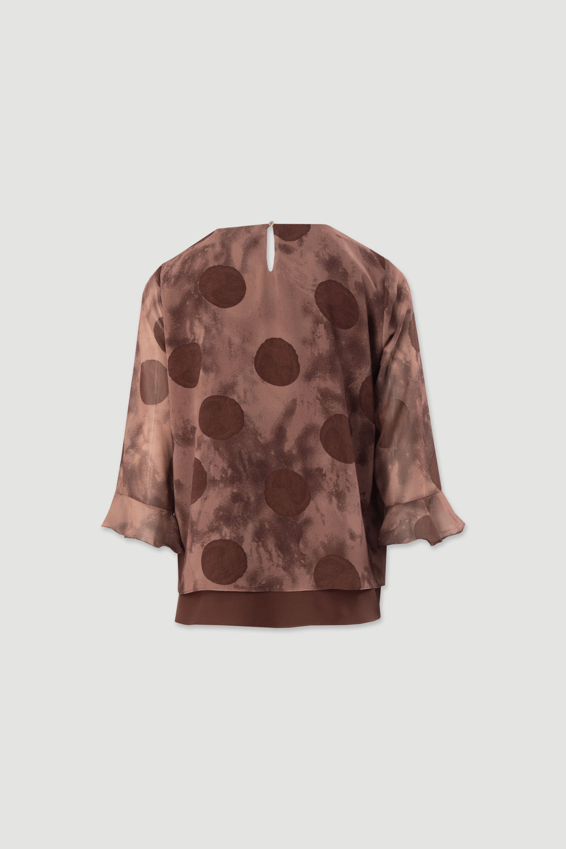 Blusa estampada con mangas con volante