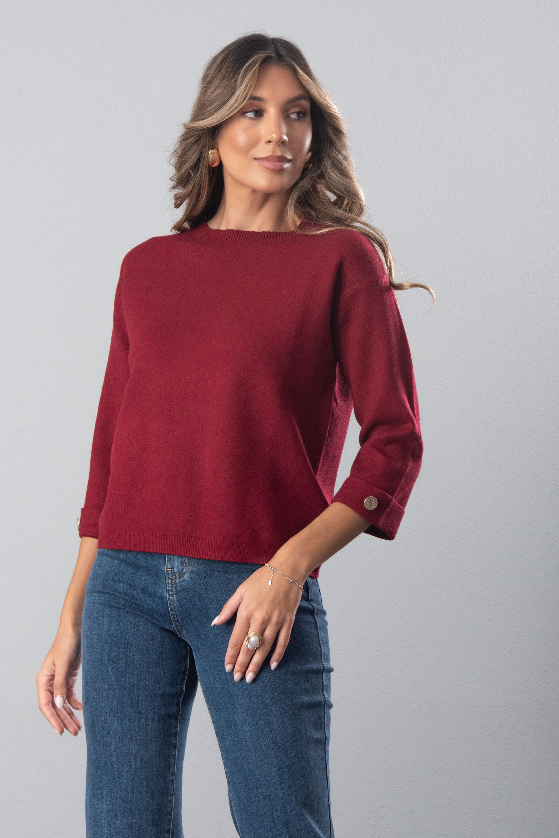 Knit sweater with 3/4 sleeves and button detail