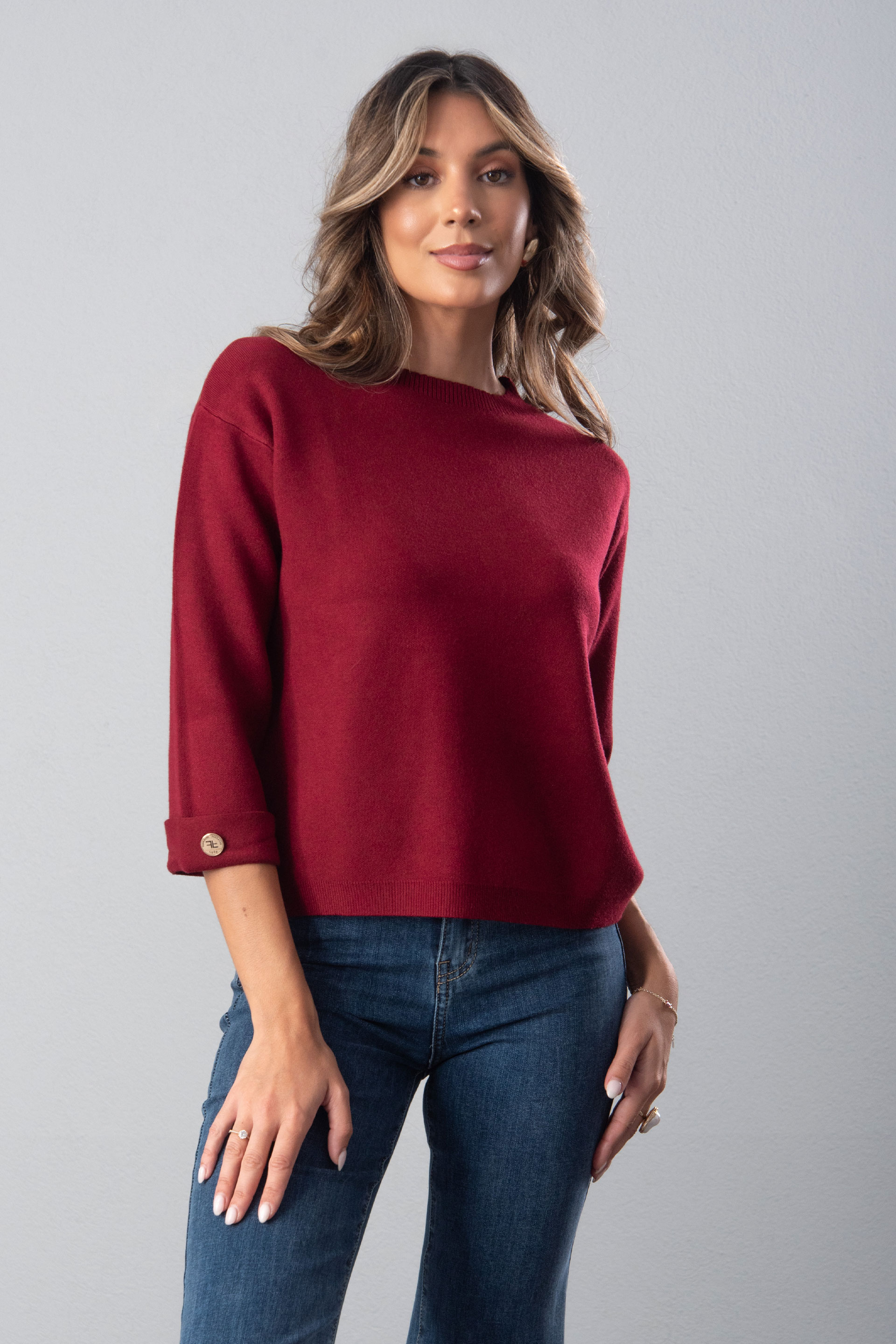 Knit sweater with 3/4 sleeves and button detail