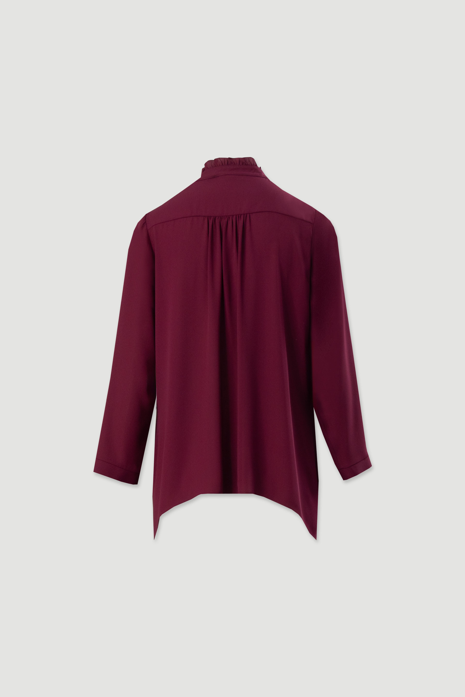 Túnica fluida con volante en el escote