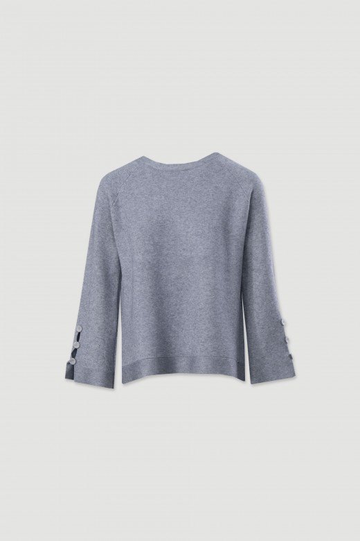 Pull en maille avec boutons dcoratifs sur les manches
