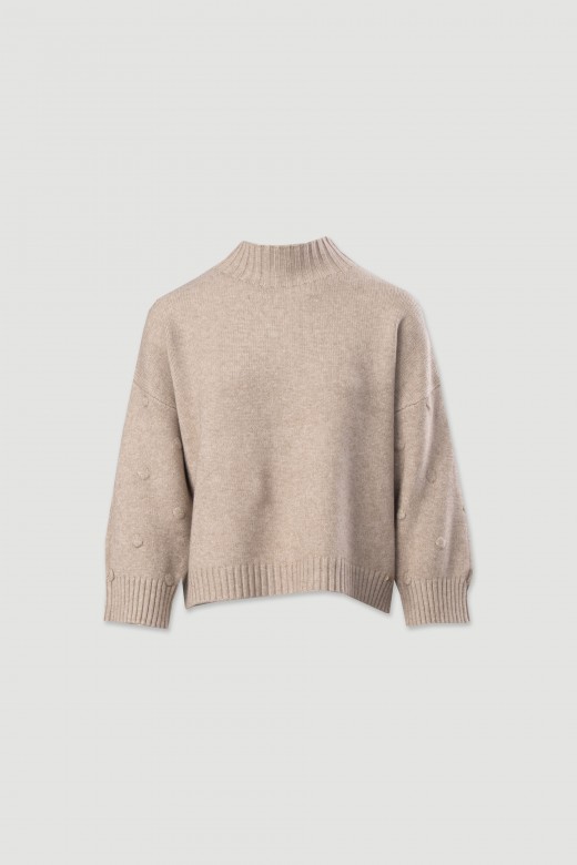 Knitted sweater with textured dots