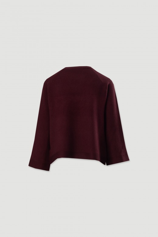 Pull en maille avec boutons dcoratifs sur les manches