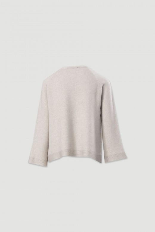Knitted sweater with decorative sleeve buttons